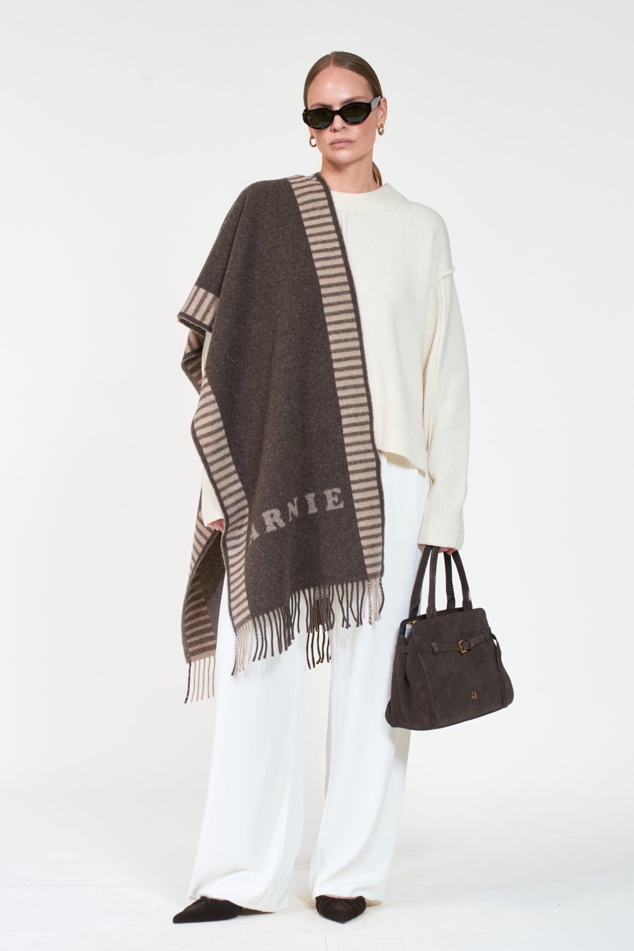 Signature, Dk Brown Melange fra Arnie Says hos Tråkk Inn